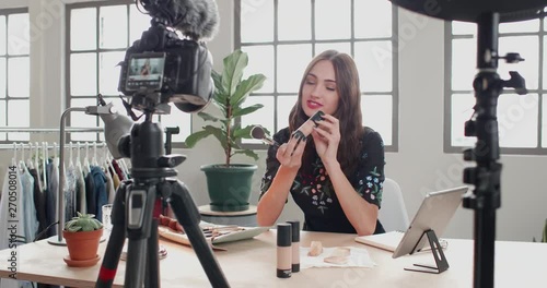beauty influencer recording daily vlog 