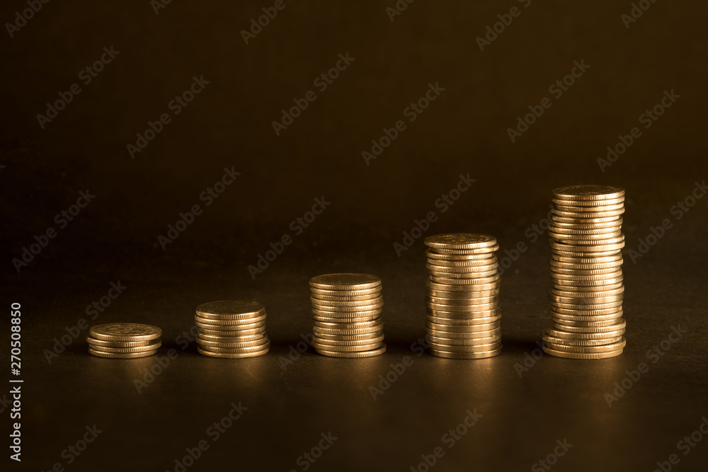 Investment concept background with graph made of coins Investment concept background with graph made of coins