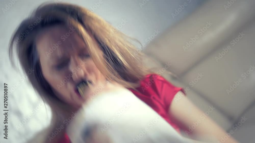 woman gets drunk at home alone at a table set for two for a romantic date, as her partner did not come on a date woman gets drunk at home alone at a table set for two for a romantic date, as her partner did not come on a date