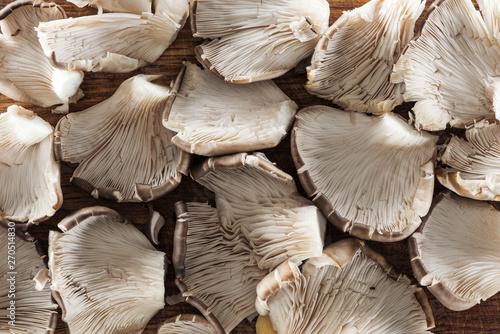 top view of white raw textured mushrooms in pile