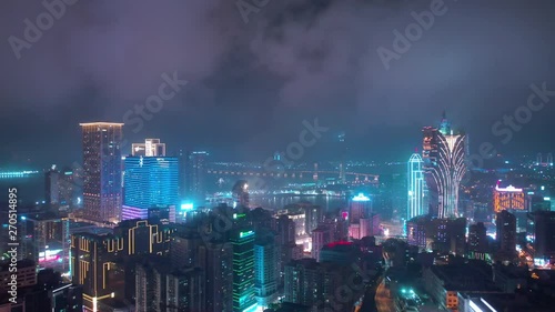 Wallpaper Mural night time illumination flight over macau city famous hotel area bay aerial panorama 4k china Torontodigital.ca