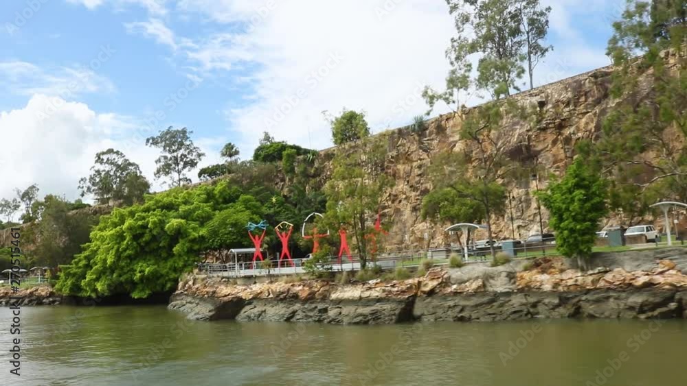 Tracking shot of Kangaroo Point Cliffs Park in Brisbane from the Brisbane River. Tracking shot of Kangaroo Point Cliffs Park in Brisbane from the Brisbane River.