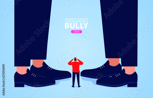 Small businessman standing at the foot of the giant