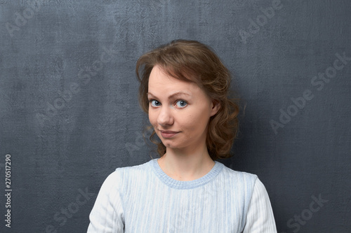 Portrait of surprised and intrigued girl