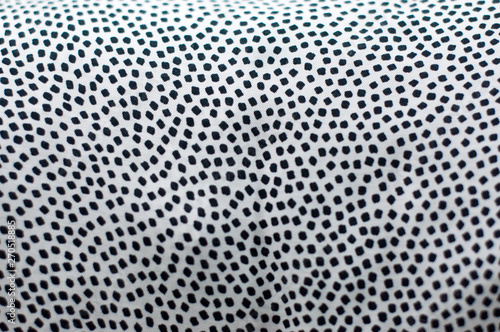 Polka dotted pattern texture background close up.