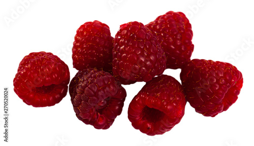 Close up of ripe red  raspberries on white surface, no people