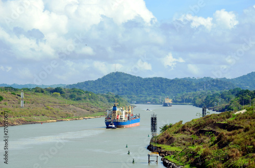 Container ships transiting through Panama Canal.