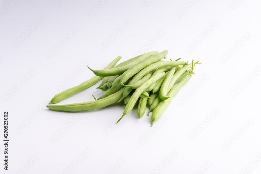 Green bean bunch closeup. Fresh Green bean Also known as French beans, string beans, snap bean, snaps and haricots vert. Green bean bunch closeup. Fresh Green bean Also known as French beans, string beans, snap bean, snaps and haricots vert.
