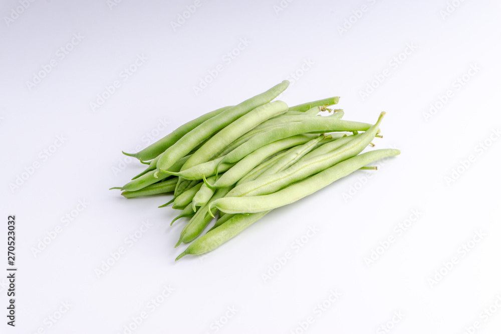 Green bean bunch closeup. Fresh Green bean Also known as French beans, string beans, snap bean, snaps and haricots vert. Green bean bunch closeup. Fresh Green bean Also known as French beans, string beans, snap bean, snaps and haricots vert.