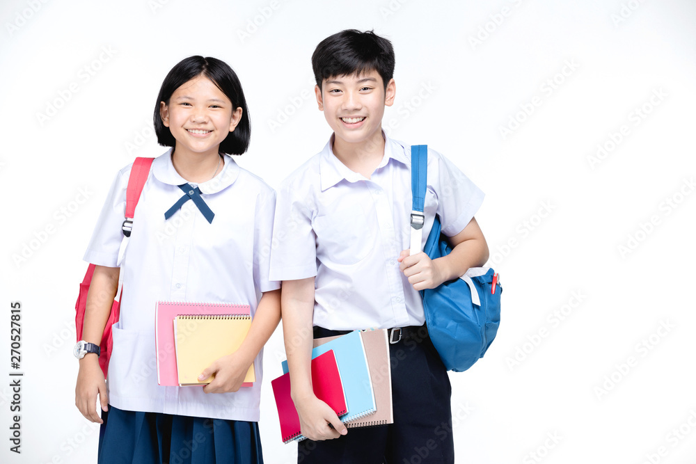 Two asian smiling school kids with colorful stationery, Two asian smiling school kids with colorful stationery,