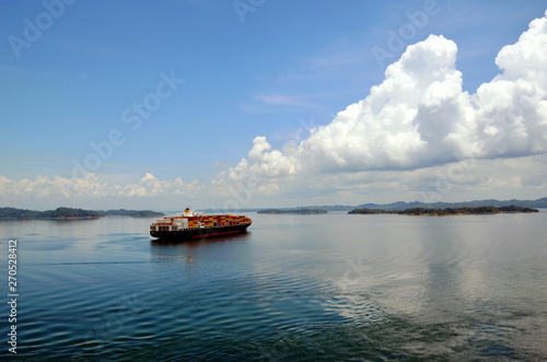 Cargo container ship transiting through Panama Canal.
