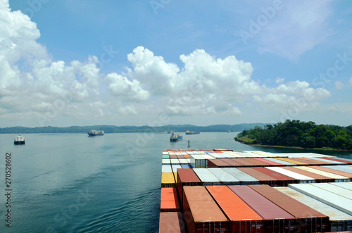 Cargo container ship transiting through Panama Canal.
