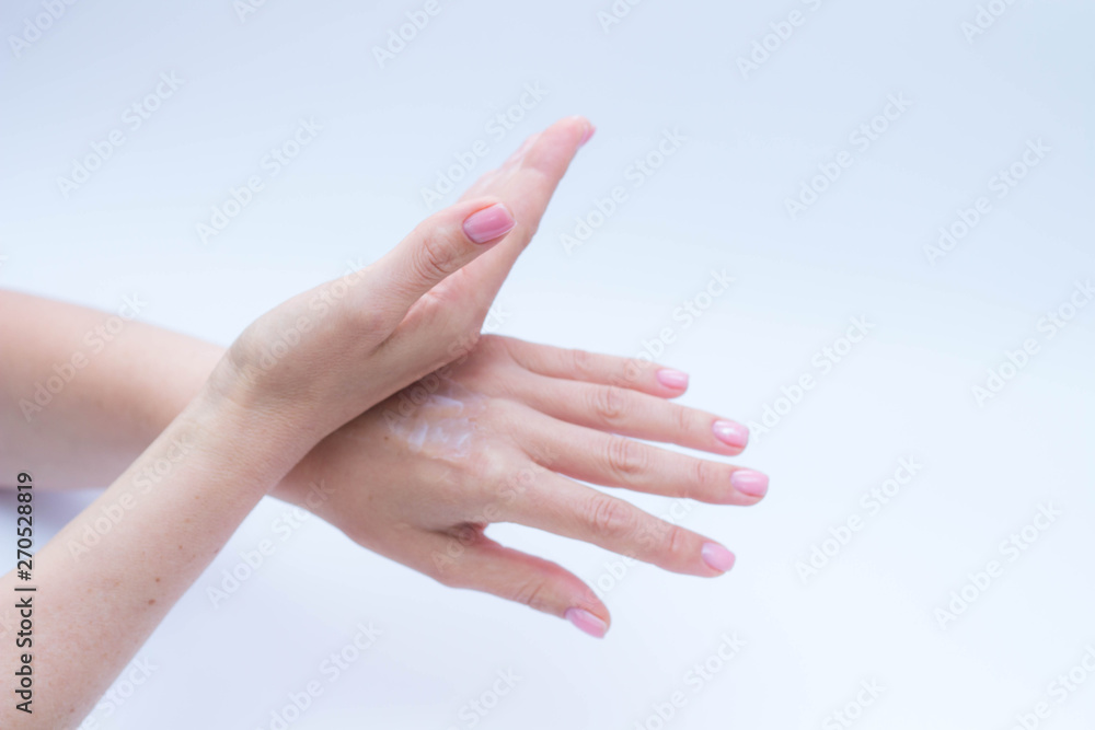 beautiful soft hands of a woman and handcream skincare