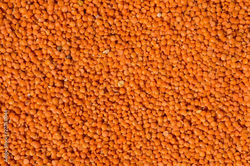 orange background pattern. background with orange lentils.