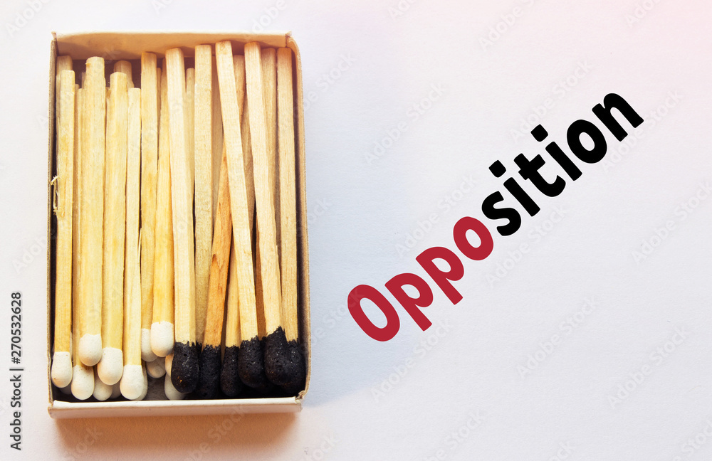 Black and white matches inside the box. Opposition and standoff concept