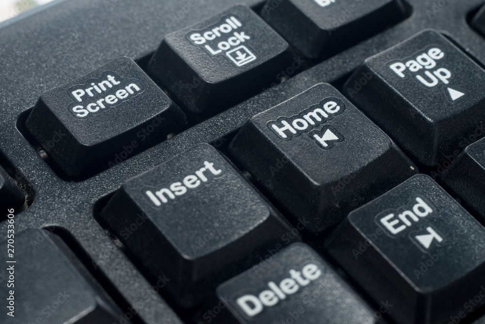 close-up home button on the computer keyboard close-up home button on the computer keyboard