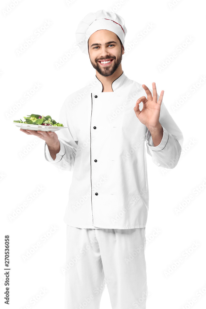 Handsome male chef with salad on white background Handsome male chef with salad on white background