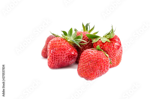 lots of strawberries close up on white background