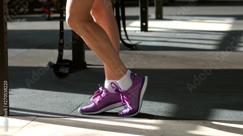 Sporty woman during workout in the gym