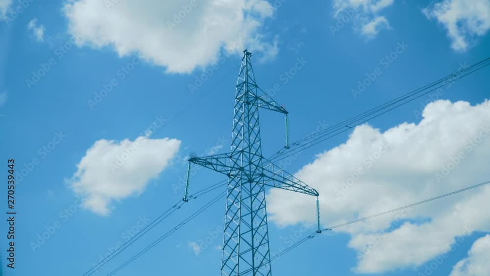 Tower power lines against the blue sky. Electric energy. Tower power lines against the blue sky. Electric energy.
