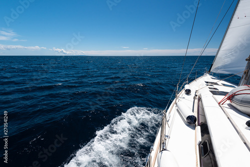 Luxury yacht at sea race. Sailing regatta. Cruise yachting © Visionsi