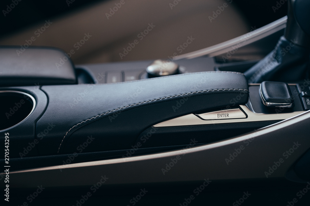 interior modern car elements, close-up of handbrake and seat belt