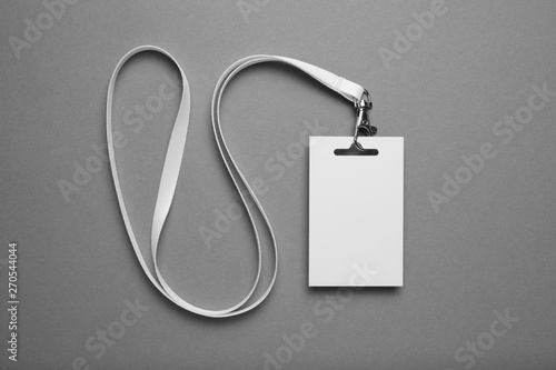 VIP name tag, event visitor card on lanyard. Business conference pass mockup on grey background.