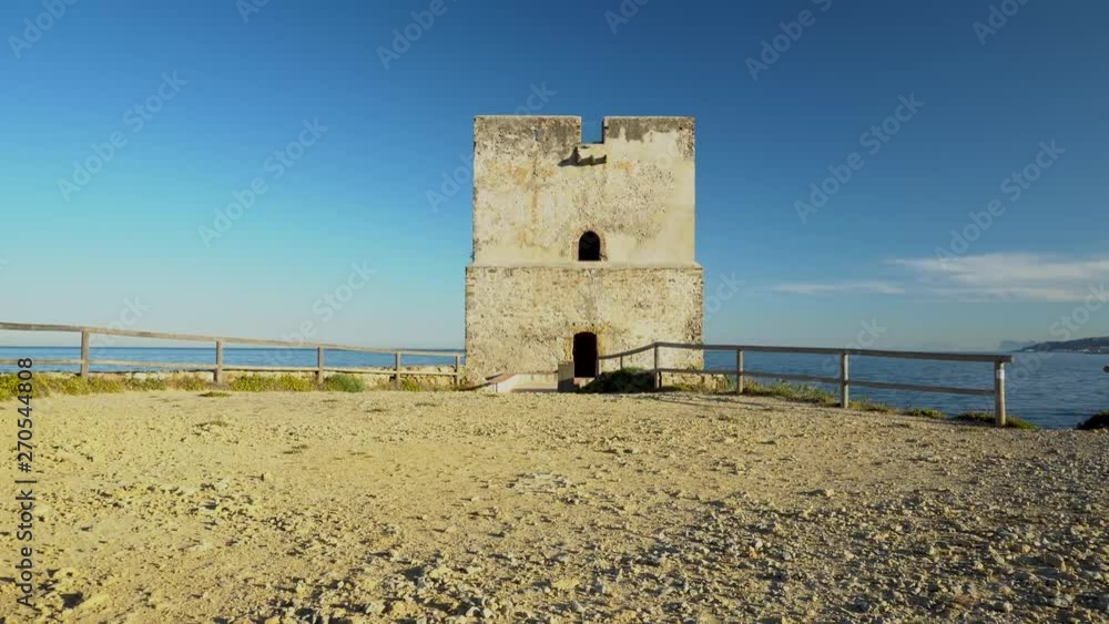 Spanish castle ruin, the Salt Tower overlooking the Mediterranean ocean Spanish castle ruin, the Salt Tower overlooking the Mediterranean ocean