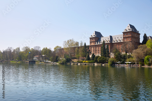 Valentino castle and Po river in a sunny spring day in Piedmont, Turin, Italy