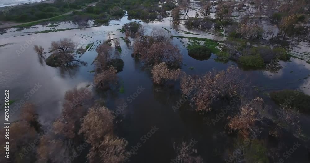 Cinematic Aerial of Flooded Field By Sea After Heavy Rainfall and Storm Waves With Sky Reflection on Water 4k Cinematic Aerial of Flooded Field By Sea After Heavy Rainfall and Storm Waves With Sky Reflection on Water 4k