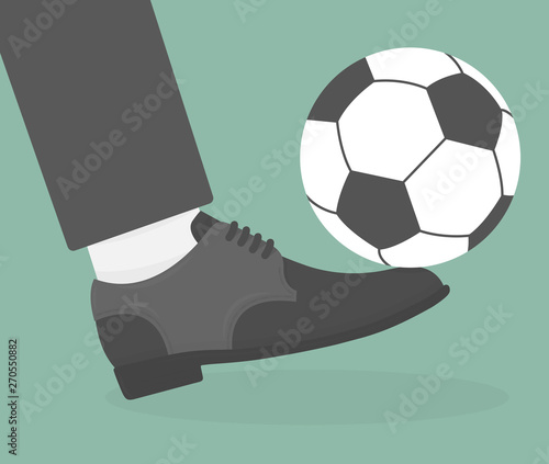 Football or soccer ball on foot