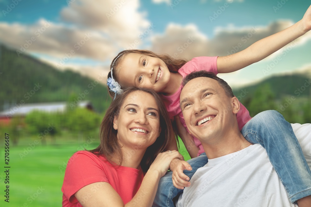 Happy cheerful family on background Happy cheerful family on background