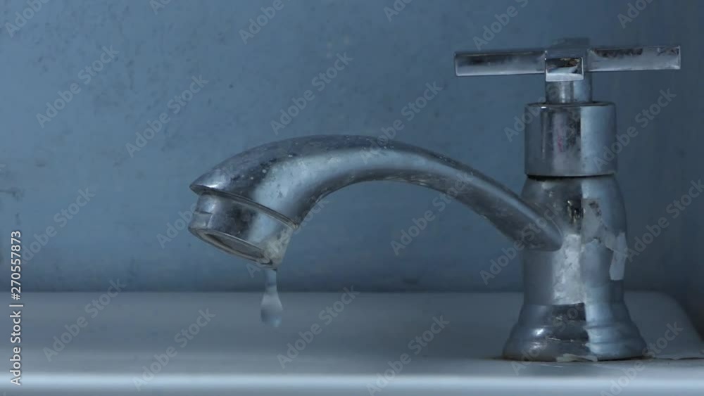 Close the old faucet. earth Day And Water Shortage Concept. Close the old faucet. earth Day And Water Shortage Concept.