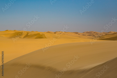 sand dune landscape in Namib desert  blue sky
