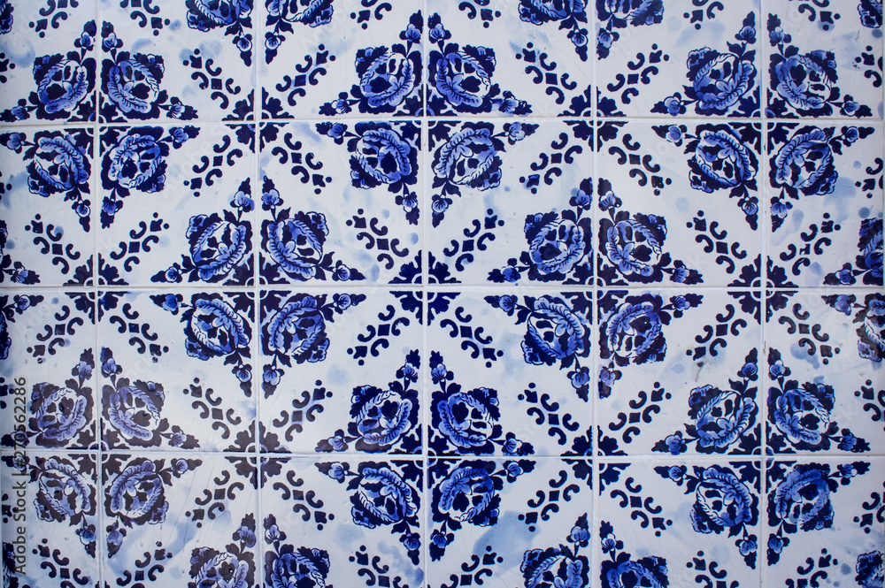 Traditional Portuguese ceramic tiles wall. Typical exterior decoration on house in Portugal.