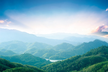 World Environment Day concept: Green mountains and beautiful sky clouds under the blue sky