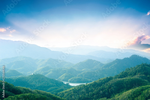 World Environment Day concept: Green mountains and beautiful sky clouds under the blue sky © paul