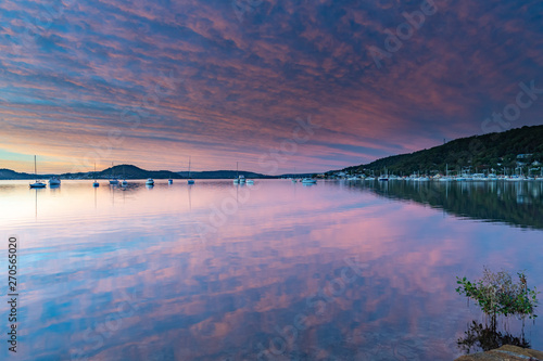 Fototapeta Naklejka Na Ścianę i Meble -  High Clouds, Boats, Reflections and Sunrise on the Bay