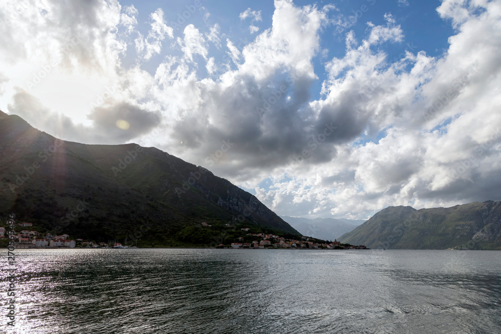 Montenegro - A view from the sea of the coastal town of Prčanj in the Bay of Kotor