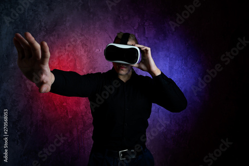 Portrait of young man with 3D virtual reality glasses  © kalinichenkod