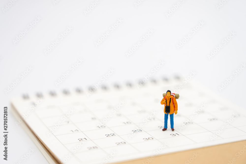 Miniature people stand on a Book Rankings (list) the beginning of the journey To reach the goal. using as background travel concept with copy spaces for your Miniature people stand on a Book Rankings (list) the beginning of the journey To reach the goal. using as background travel concept with copy spaces for your