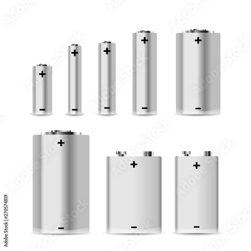 Large set of different alkaline batteries on white