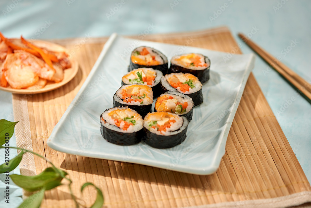 Korean roll Gimbap(kimbob) made from steamed white rice (bap) and various other ingredients Korean roll Gimbap(kimbob) made from steamed white rice (bap) and various other ingredients