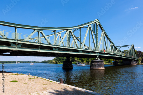 Fototapeta Naklejka Na Ścianę i Meble -  Glienicke Bridge across narrow point of Glienicker Lake outside Potsdam, Germany