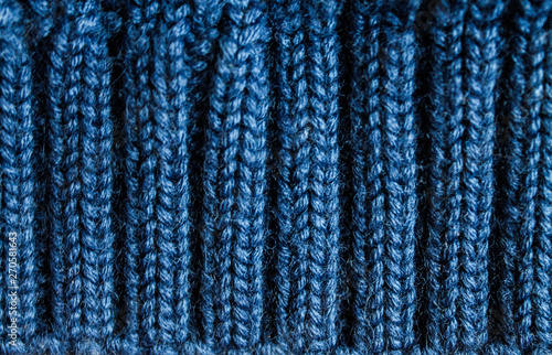 Cozy dark blue knitted texture backround, wool backdrop