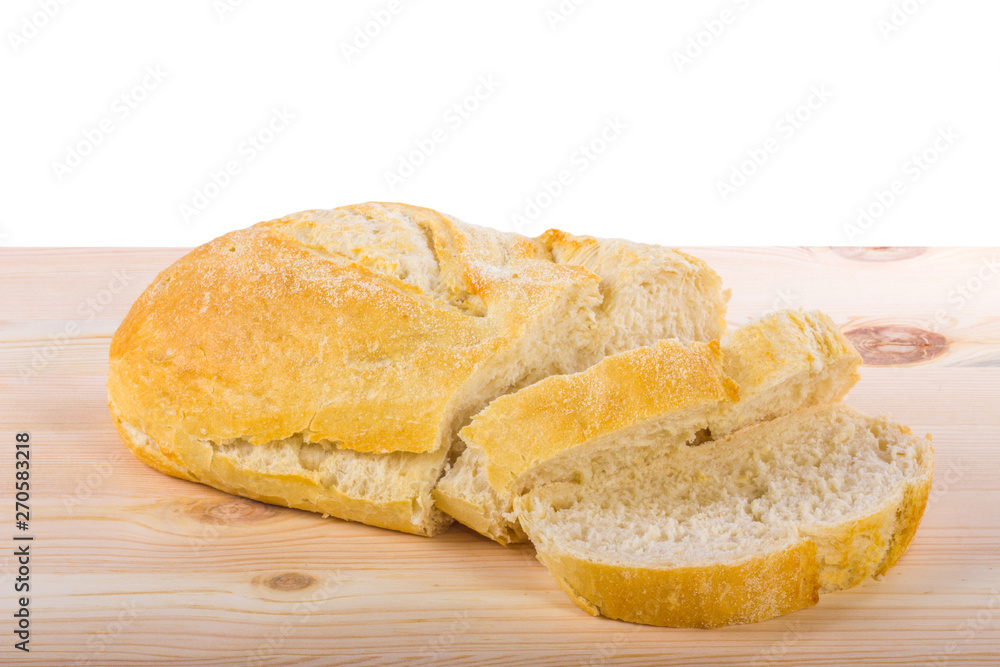 A traditional homemade bread on a wooden surface