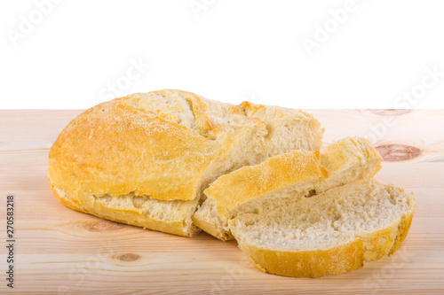 A traditional homemade bread on a wooden surface