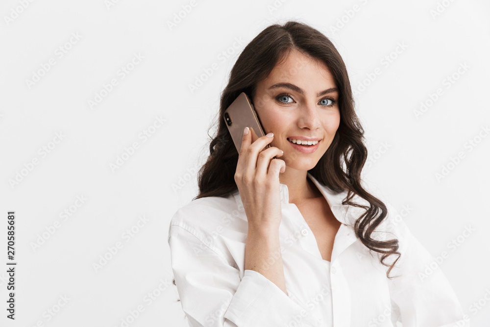 Beautiful young woman with long curly brunette hair Beautiful young woman with long curly brunette hair