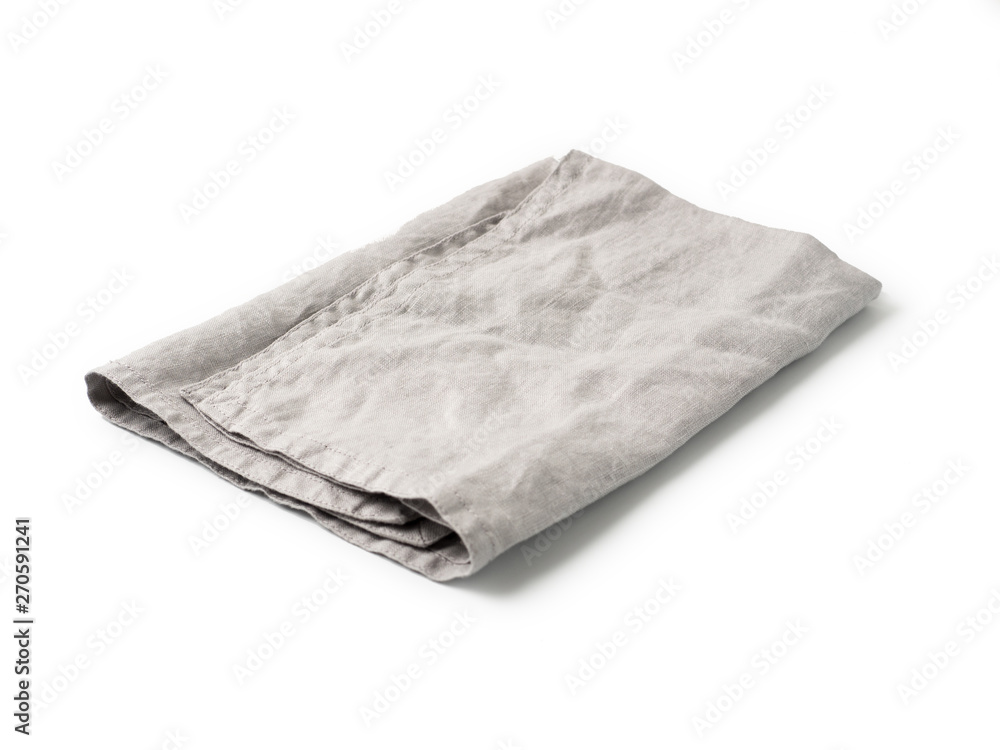Side view on folded gray linen napkin isolated on white background. light gray linen napkin. Isolated on white with clipping path. Side view on folded gray linen napkin isolated on white background. light gray linen napkin. Isolated on white with clipping path.
