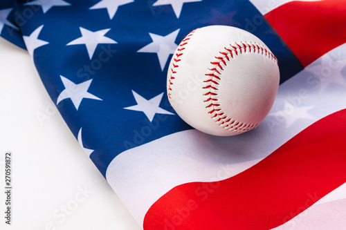 New baseball ball on American flag